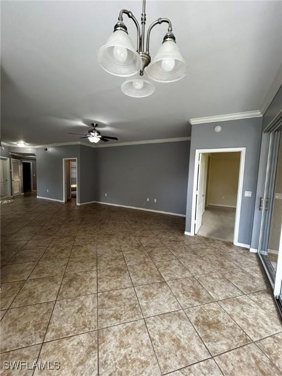 unfurnished room with crown molding, ceiling fan with notable chandelier, baseboards, and tile patterned floors