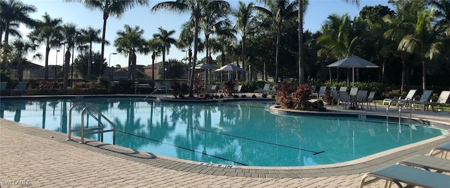 community pool with a patio