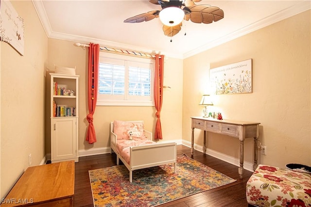 bedroom featuring baseboards, ceiling fan, dark wood finished floors, and crown molding