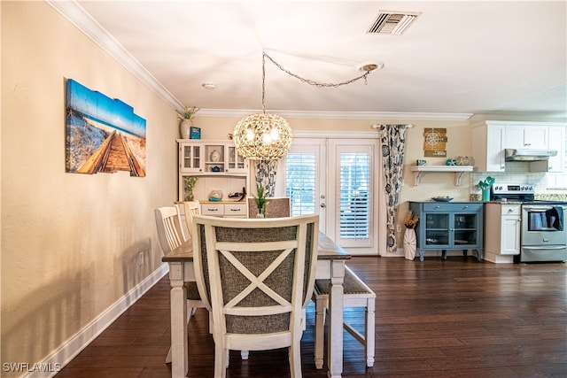 dining area with a notable chandelier, dark wood-type flooring, and ornamental molding