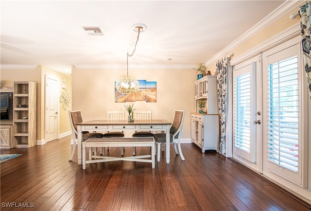 dining space with a wealth of natural light, crown molding, an inviting chandelier, and dark hardwood / wood-style floors