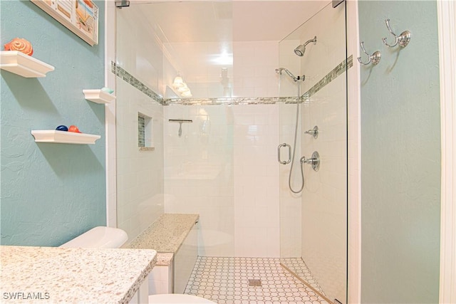 1316 Sunbury Dr, Fort Myers, FL 33901 - full bathroom featuring toilet, a textured wall, vanity, and a stall shower