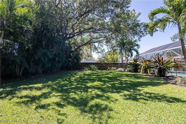 1316 Sunbury Dr, Fort Myers, FL 33901 - view of yard with a fenced in pool, a lanai, and a fenced backyard