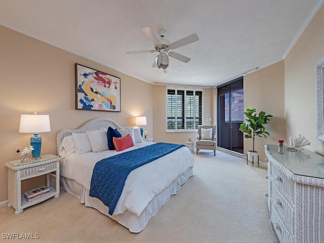 bedroom featuring ceiling fan, light colored carpet, and ornamental molding