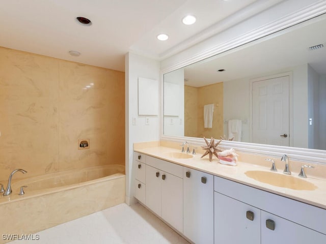 bathroom featuring a bathtub and vanity