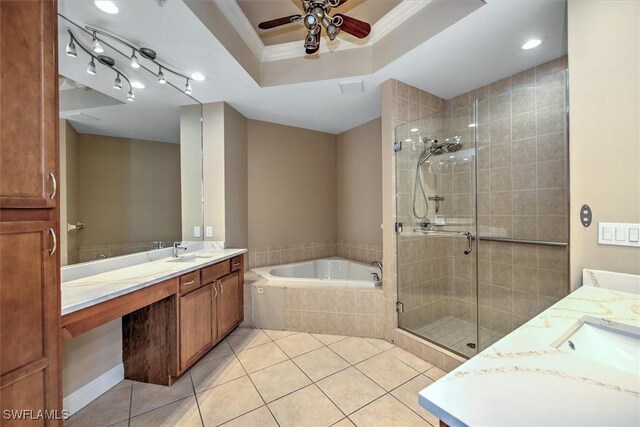 full bathroom featuring a shower stall, vanity, ceiling fan, and tile patterned flooring