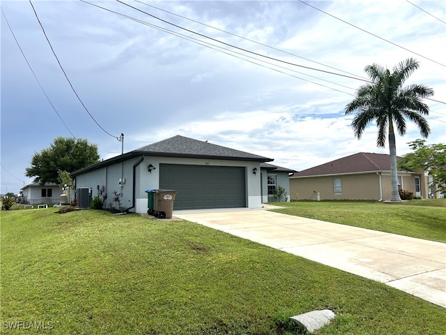 ranch-style home with a front lawn and a garage