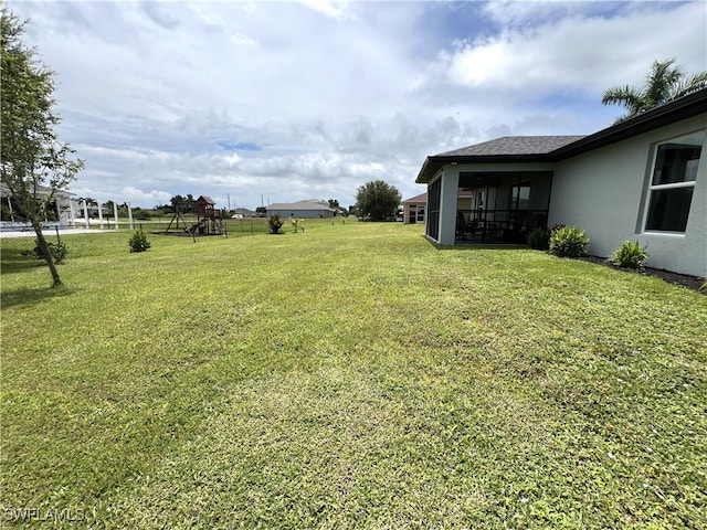 view of yard featuring a playground