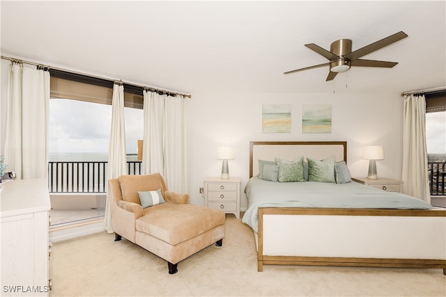 bedroom featuring ceiling fan and light colored carpet