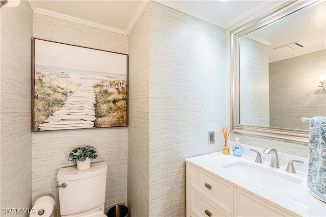 bathroom featuring tile walls, toilet, ornamental molding, and vanity