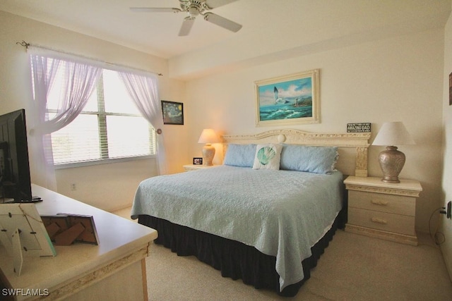 bedroom featuring ceiling fan and light colored carpet