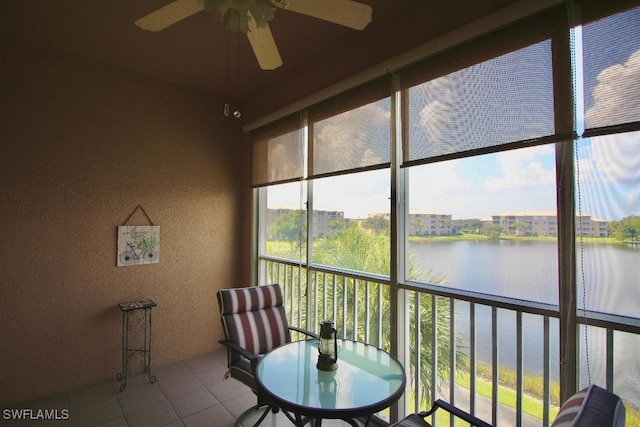 sunroom with a water view