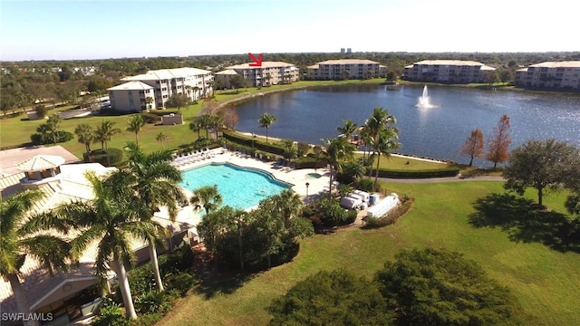 drone / aerial view with a water view