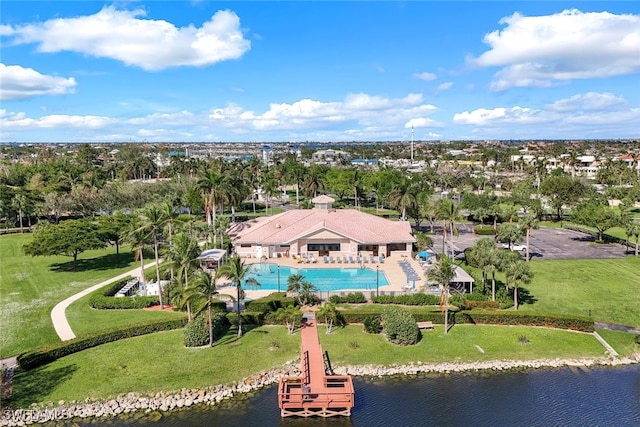 birds eye view of property featuring a water view