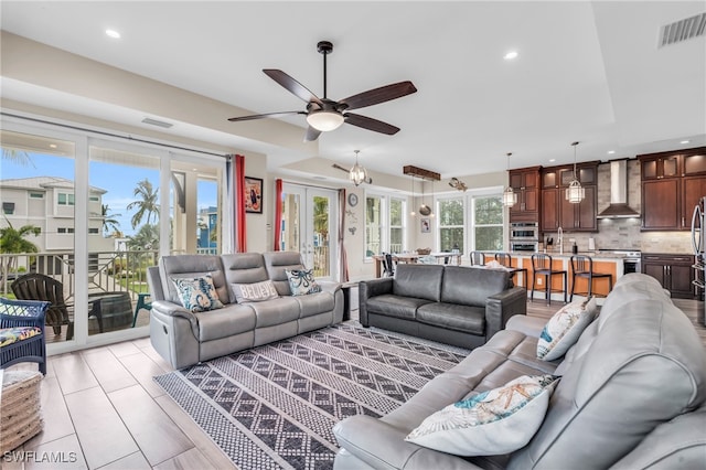 living room with ceiling fan