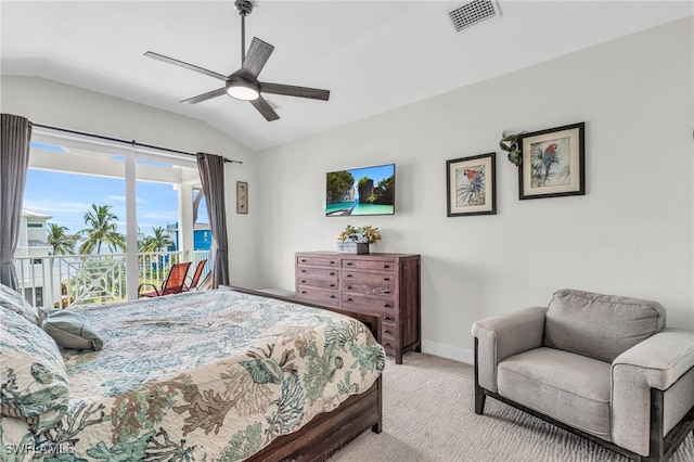 carpeted bedroom with vaulted ceiling and ceiling fan