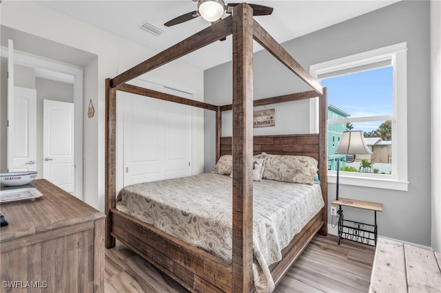 bedroom featuring ceiling fan and light hardwood / wood-style floors