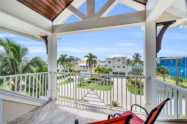 view of patio with a balcony