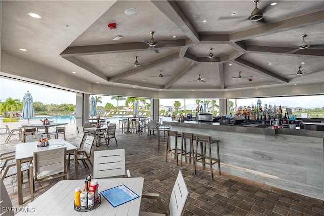 view of patio with a bar