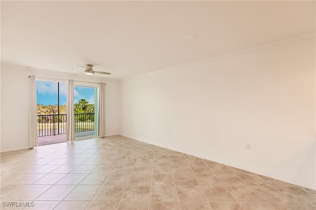 spare room with light tile patterned flooring and ceiling fan