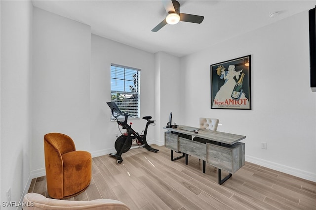 interior space with ceiling fan and light hardwood / wood-style flooring