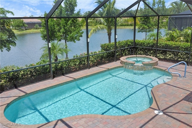 view of pool featuring an in ground hot tub, a lanai, and a water view