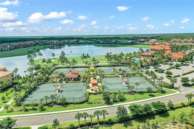 birds eye view of property with a water view