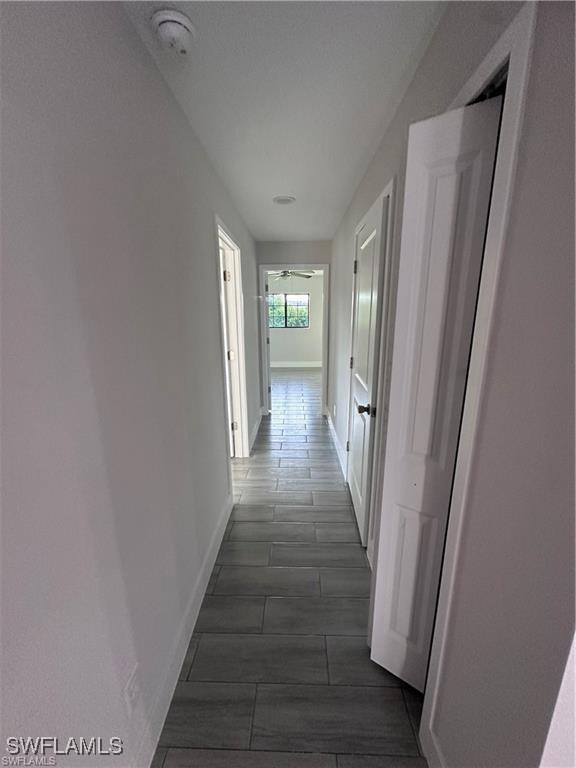 corridor with baseboards