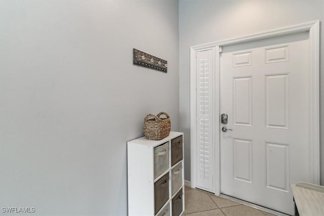 entrance foyer featuring light tile patterned floors