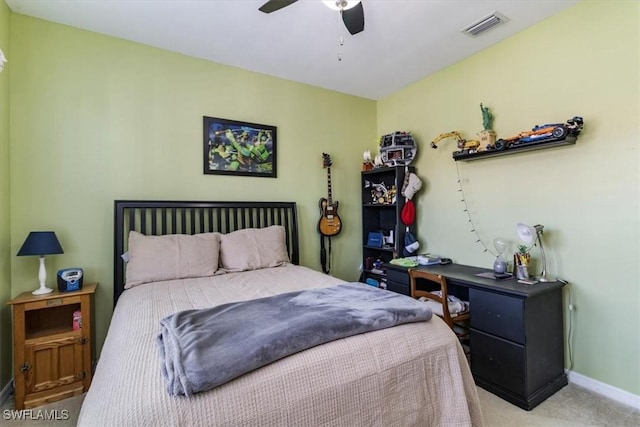 bedroom with a ceiling fan, carpet, visible vents, and baseboards