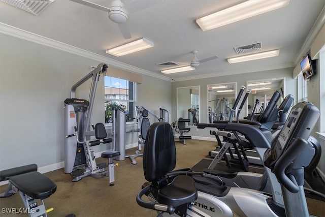 workout area with crown molding, visible vents, and ceiling fan