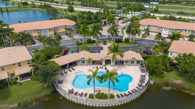 aerial view with a water view and a residential view