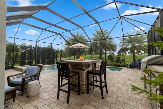 view of patio featuring outdoor dry bar, area for grilling, a lanai, and an outdoor pool