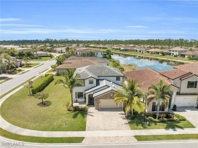 bird's eye view with a water view