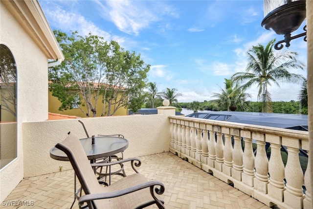 view of patio with a balcony