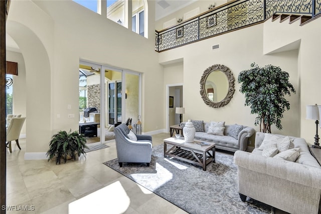 living room with a high ceiling