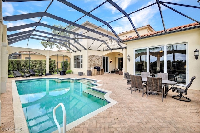 view of pool featuring a lanai and a patio