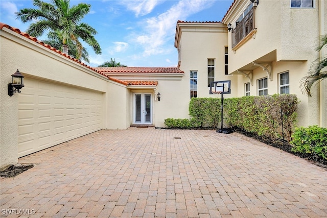 view of patio / terrace with a garage