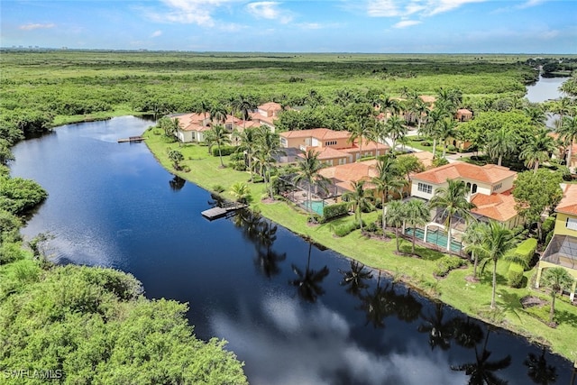 drone / aerial view with a water view