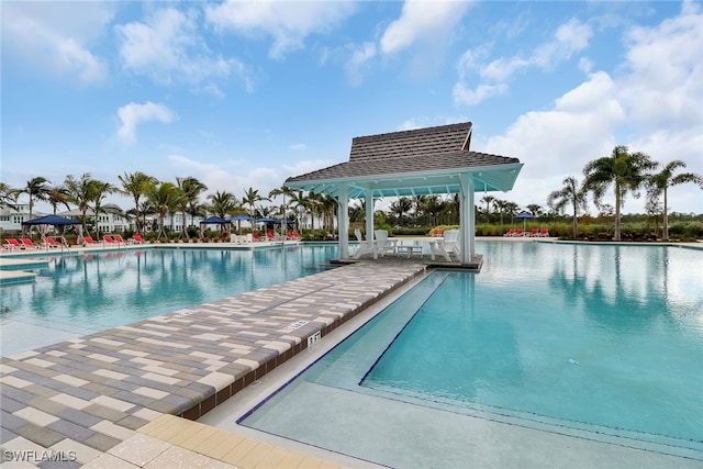 view of swimming pool with a patio area