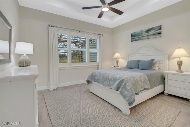 bedroom featuring ceiling fan and light wood-type flooring