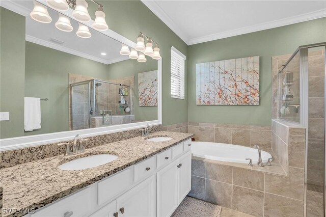 bathroom featuring vanity, tile patterned flooring, crown molding, and plus walk in shower