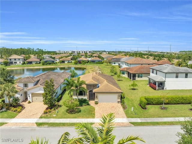 birds eye view of property featuring a water view