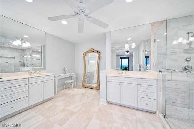 bathroom featuring ceiling fan, a shower with door, double sink vanity, and tile patterned flooring