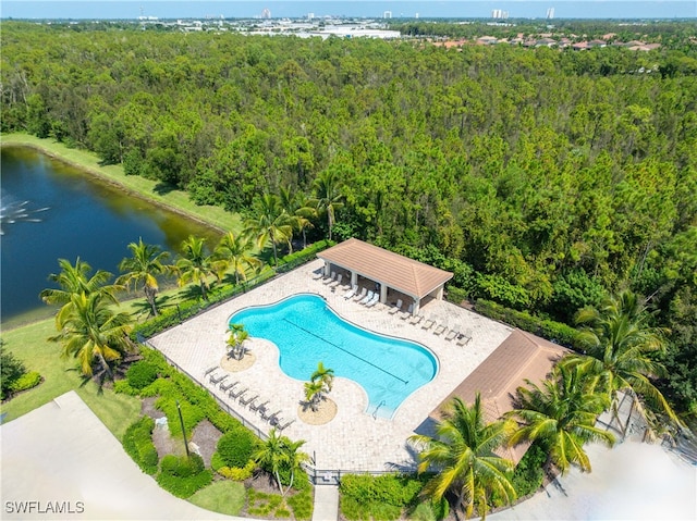 view of pool with a water view