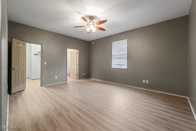 unfurnished bedroom with light hardwood / wood-style flooring and ceiling fan