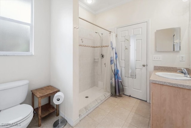 bathroom featuring a shower with curtain, toilet, crown molding, and vanity