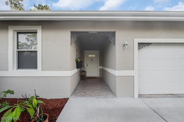 property entrance featuring a garage