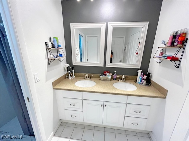 bathroom with vanity and tile patterned floors