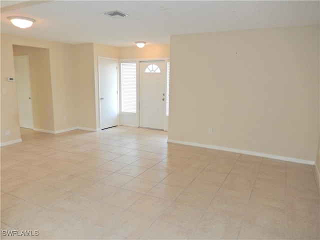 view of tiled spare room